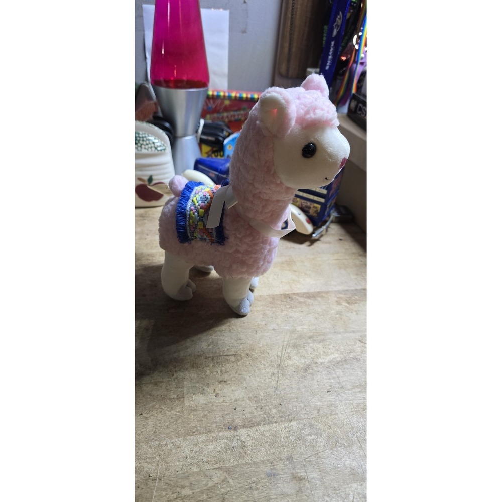 Frankford Candy pink plush alpaca with a ribbon